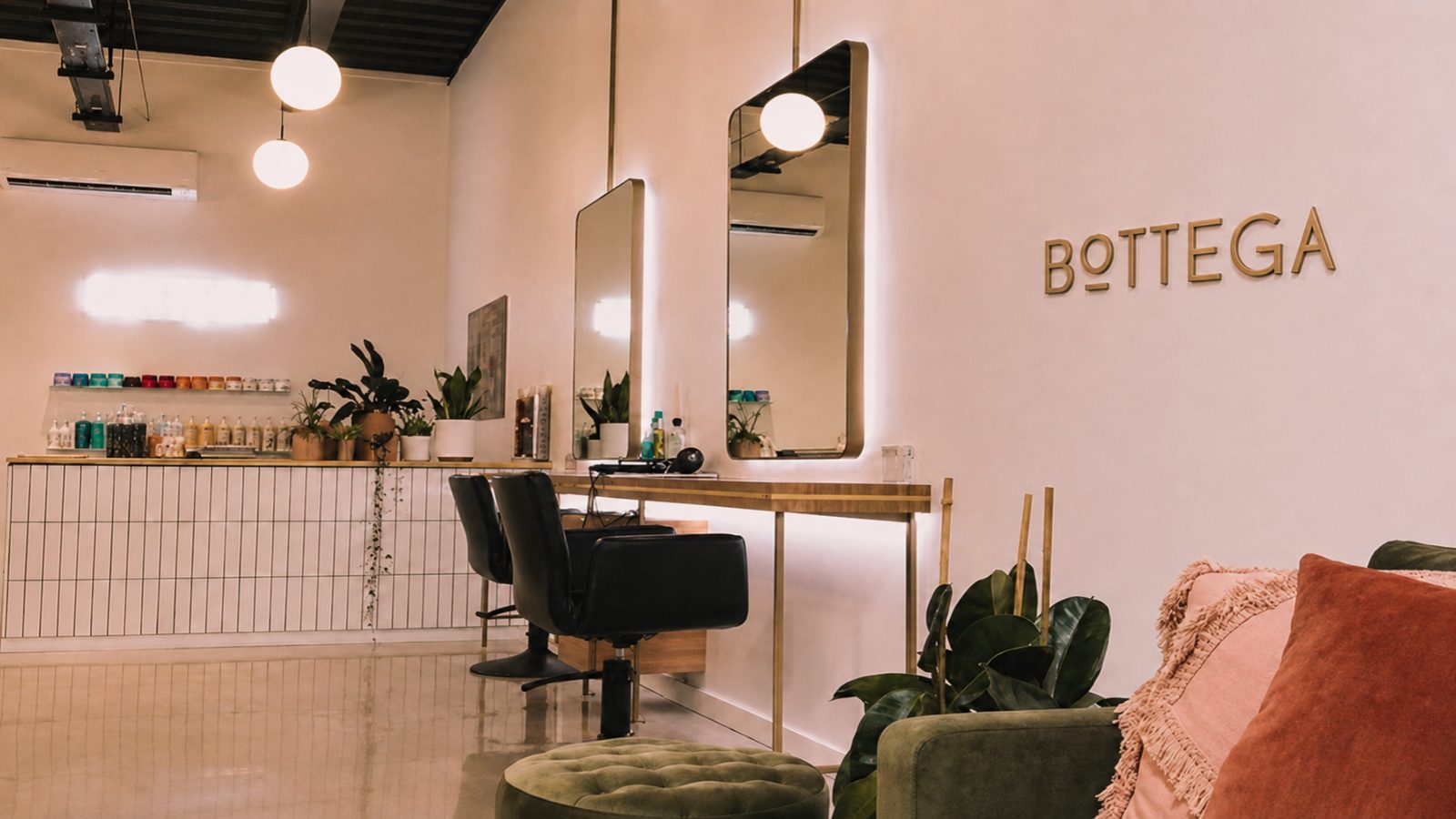 Bottega salon interior with wall-mounted signage